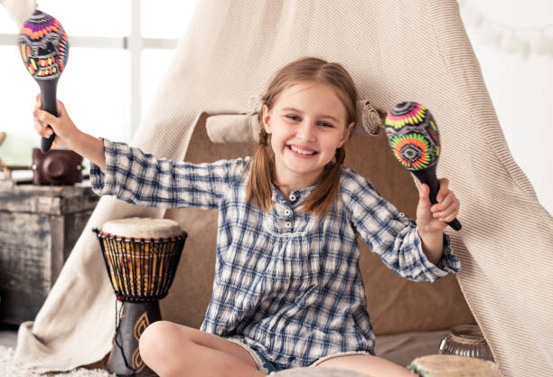 Kids enjoying a drumming session at a birthday celebration